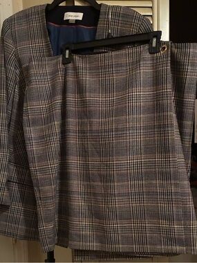NWT Calvin Klein women’s suit, jacket, and skirt. Fully lined, size women’s 18.
